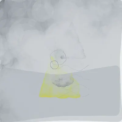 a paper boat on a puddle